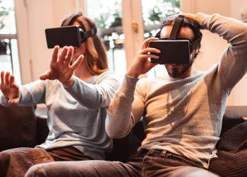 family at home using VR headset
