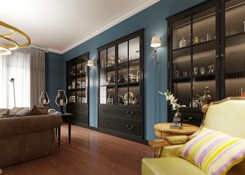 Bookcases built into the wall, with books in the classic living room. Wooden console by the sofa with decor. Black furniture and sconces on the wall. 3D rendering.